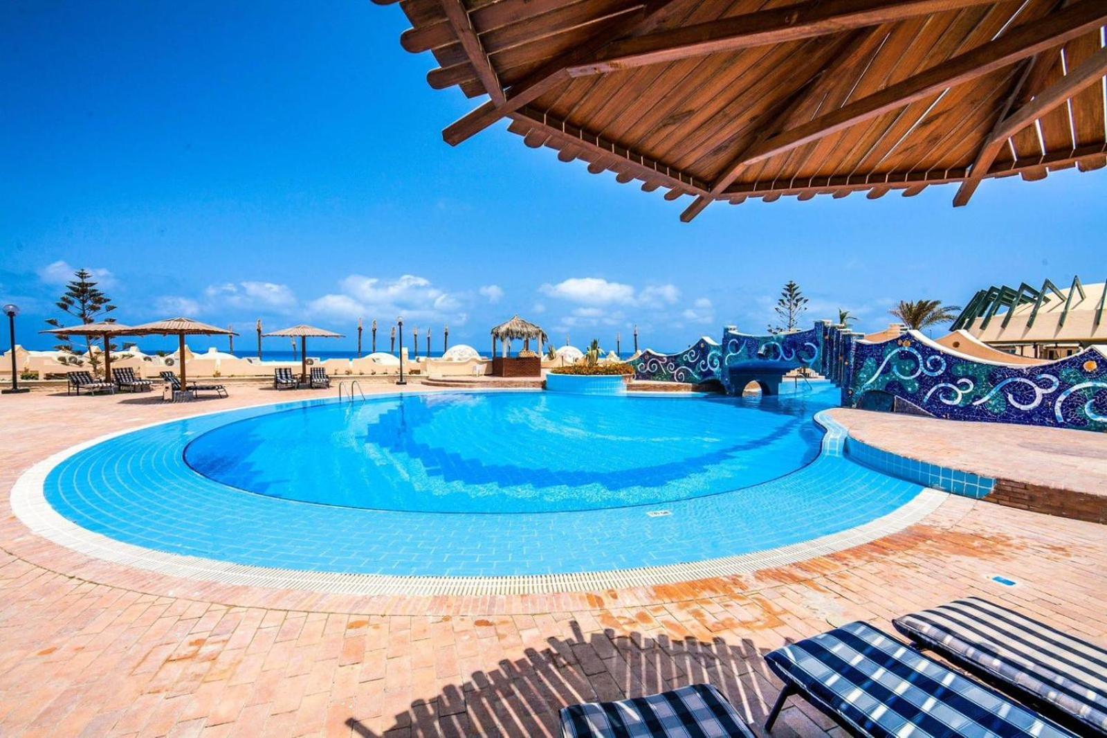 Borg El Arab Beach Resort Экстерьер фото The swimming pool at the hotel